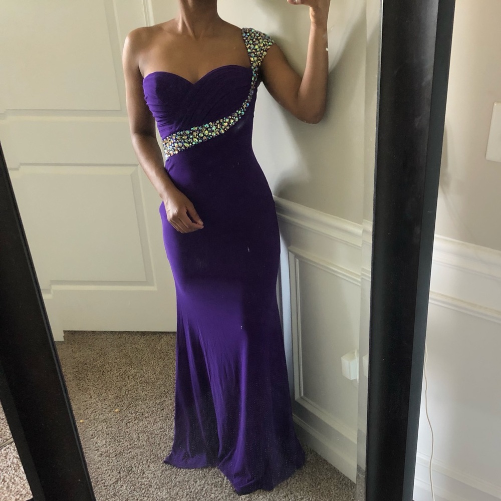 Purple jeweled dress.